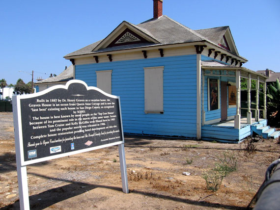Graves House, painted sky blue with a historic marker, date unknown.