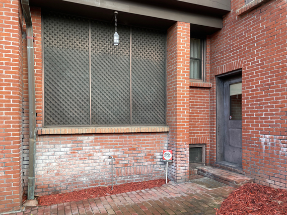 Photo of sections of brick wall near the Marston House back door
