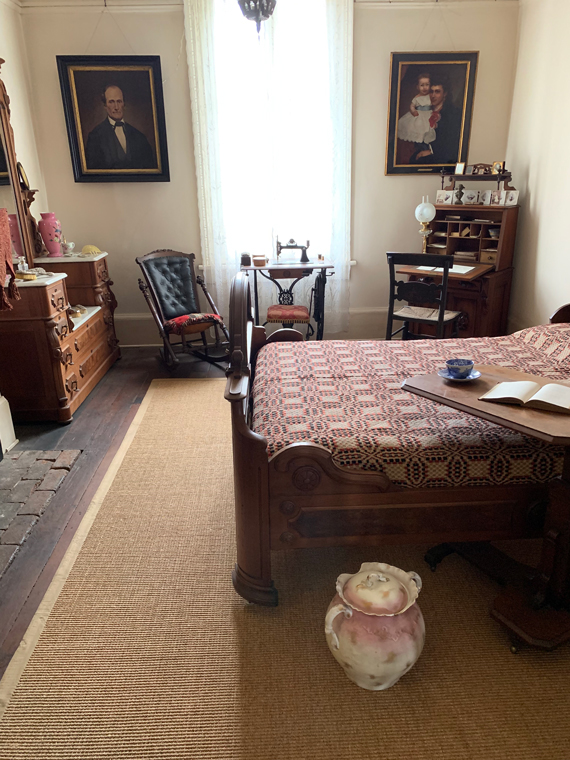 Whaley House master bedroom looks and feels cooler for summer with new woven straw floor matting.