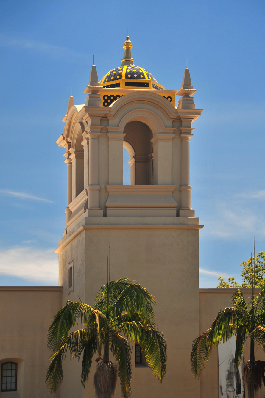 Photo of tower with tile dome as viewed from Alcazar Garden.